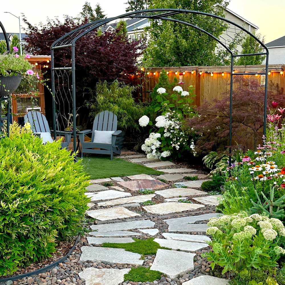 metal monet garden arch with a path underneath